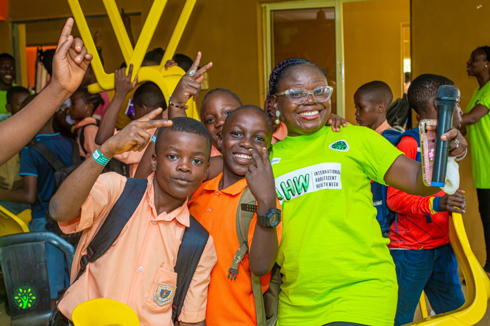 AHWF facilitator with smiling students