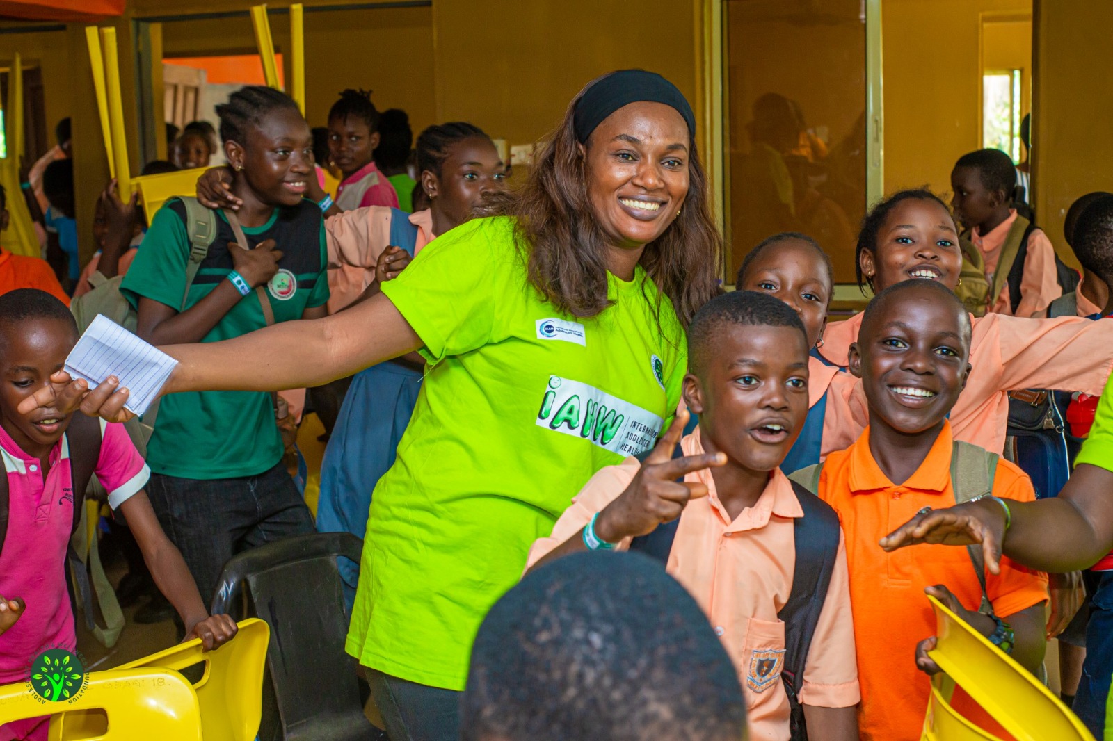 AHWF volunteer engaging students at an event