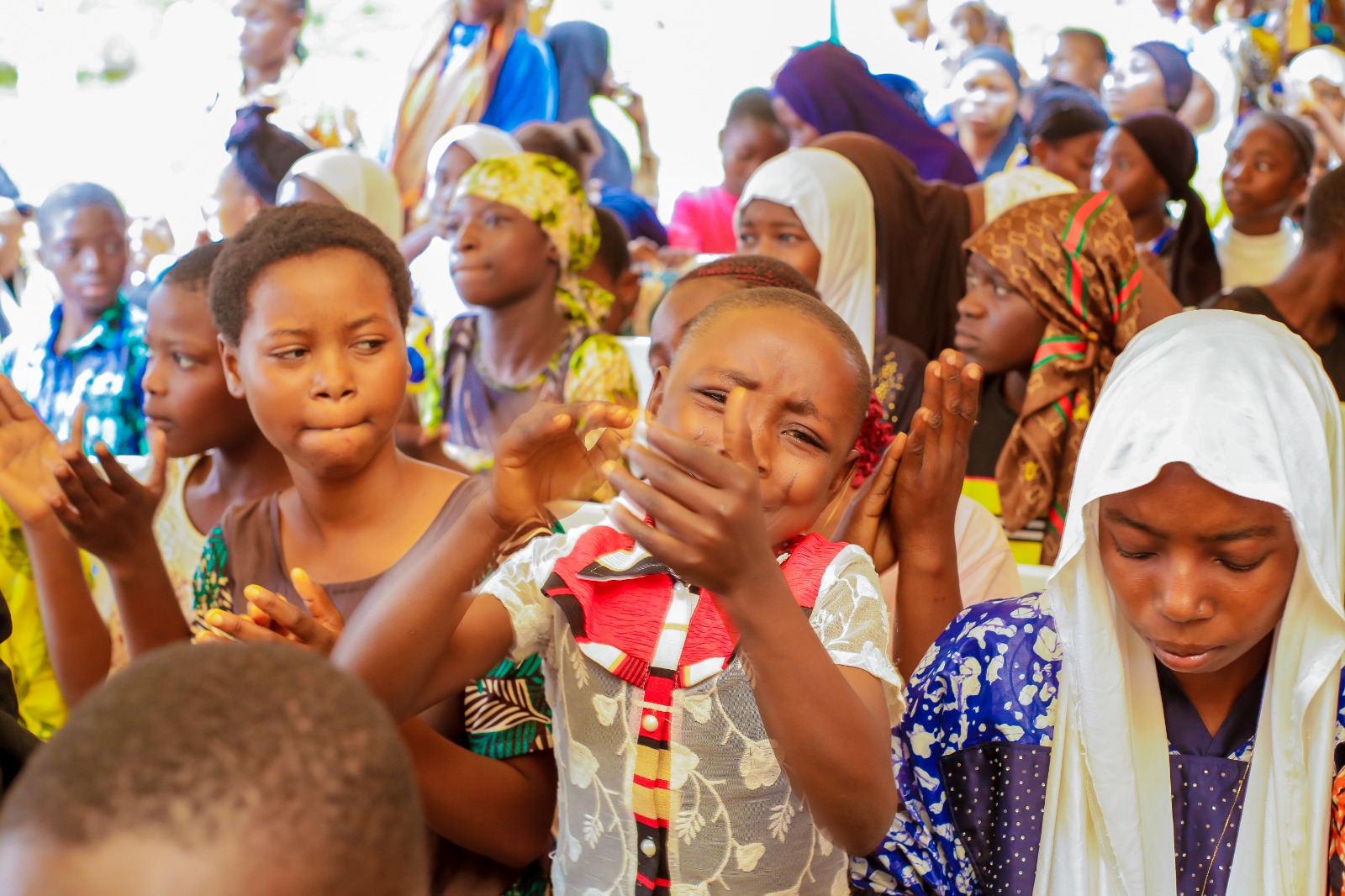 Adolescent girls at a community outreach gathering